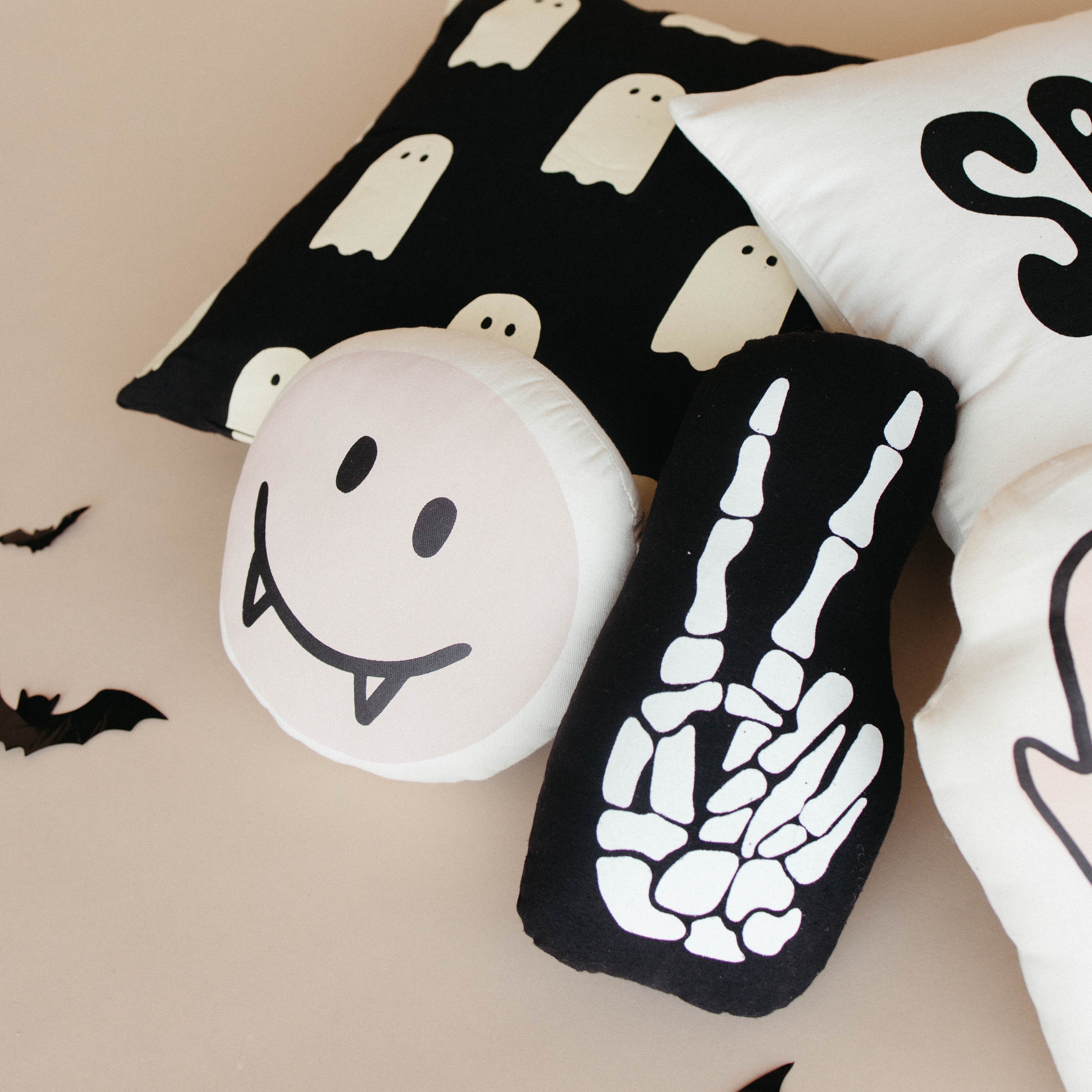 skeleton peace sign pillow