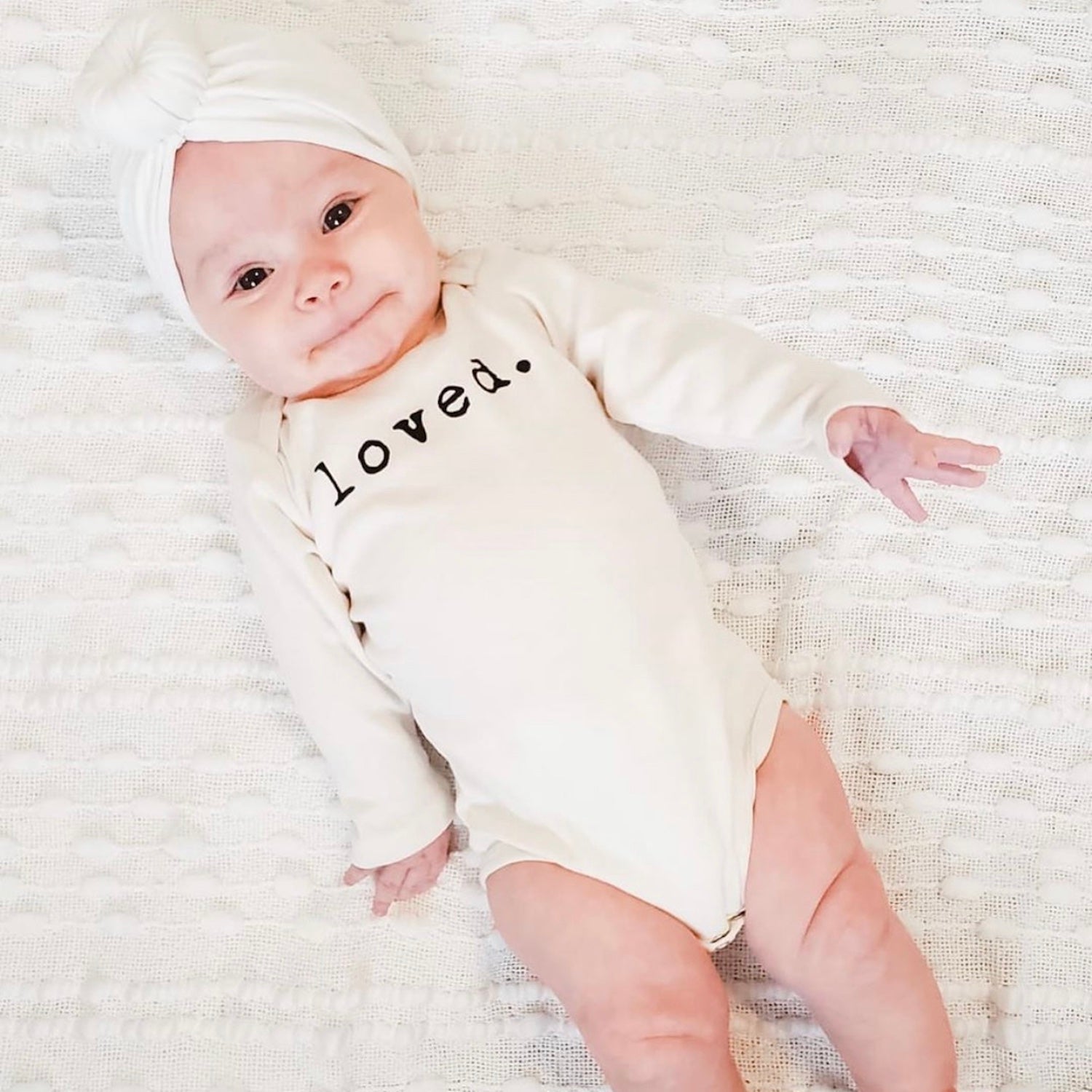 Baby Loved. Long-Sleeve Organic Cotton Bodysuit