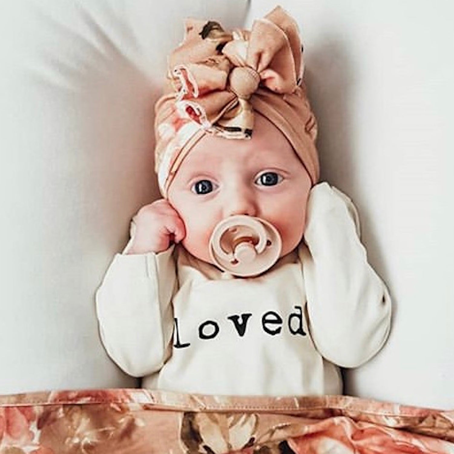 Baby Loved. Long-Sleeve Organic Cotton Bodysuit