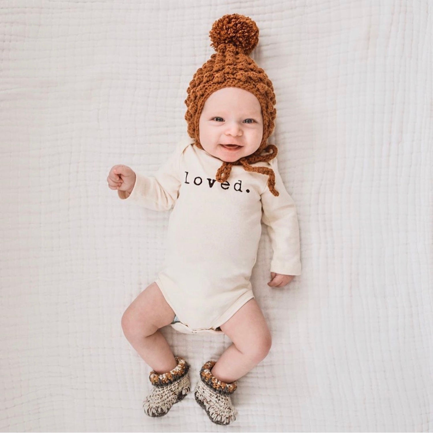 Baby Loved. Long-Sleeve Organic Cotton Bodysuit